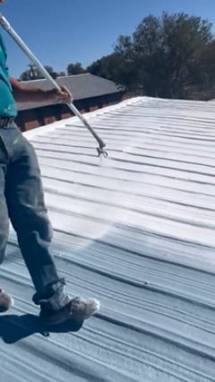 Spray roofing application on new and restored metal roofs